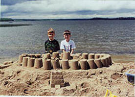 Building a sandcastle at Tepee-Tonka Resort